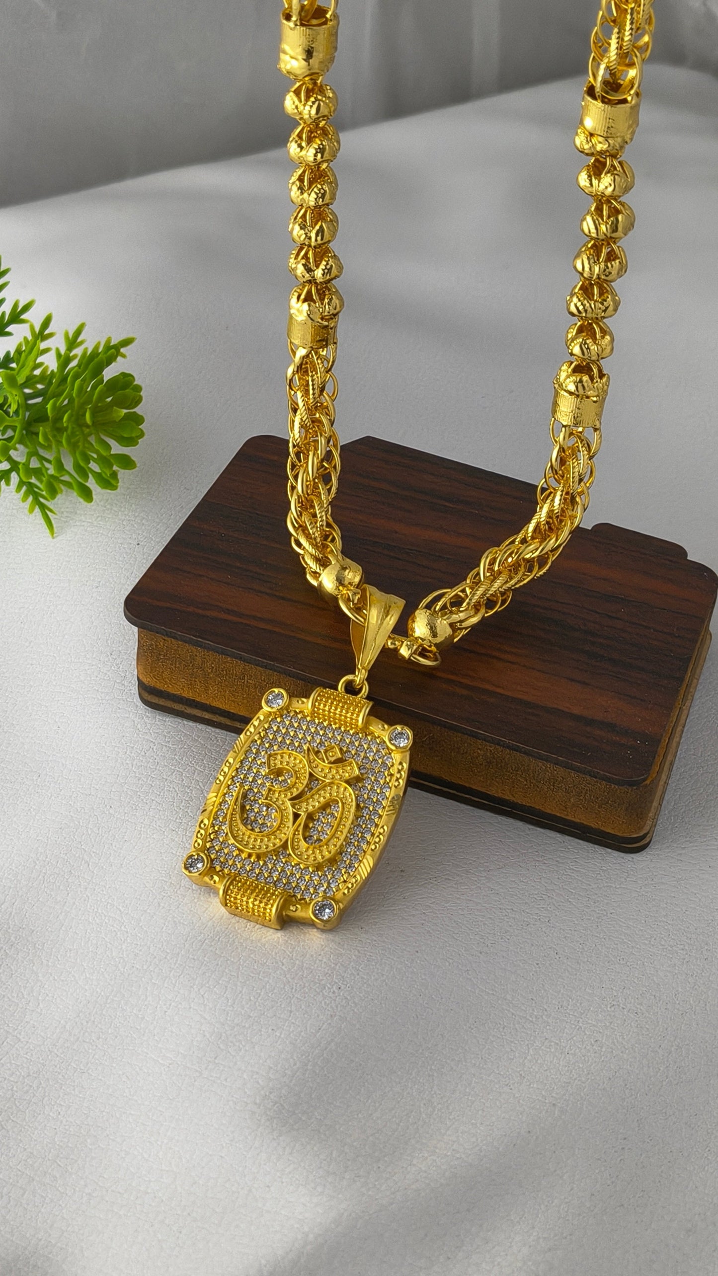Gold-plated OM pendant with Bahubali heavy design chain Combo Set.