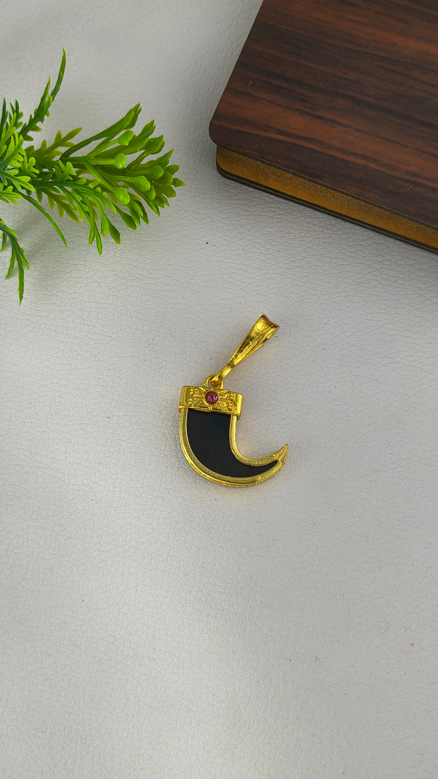 Rajwadi Single Black Nail Highly gold plated pendant from arbuda imitation.