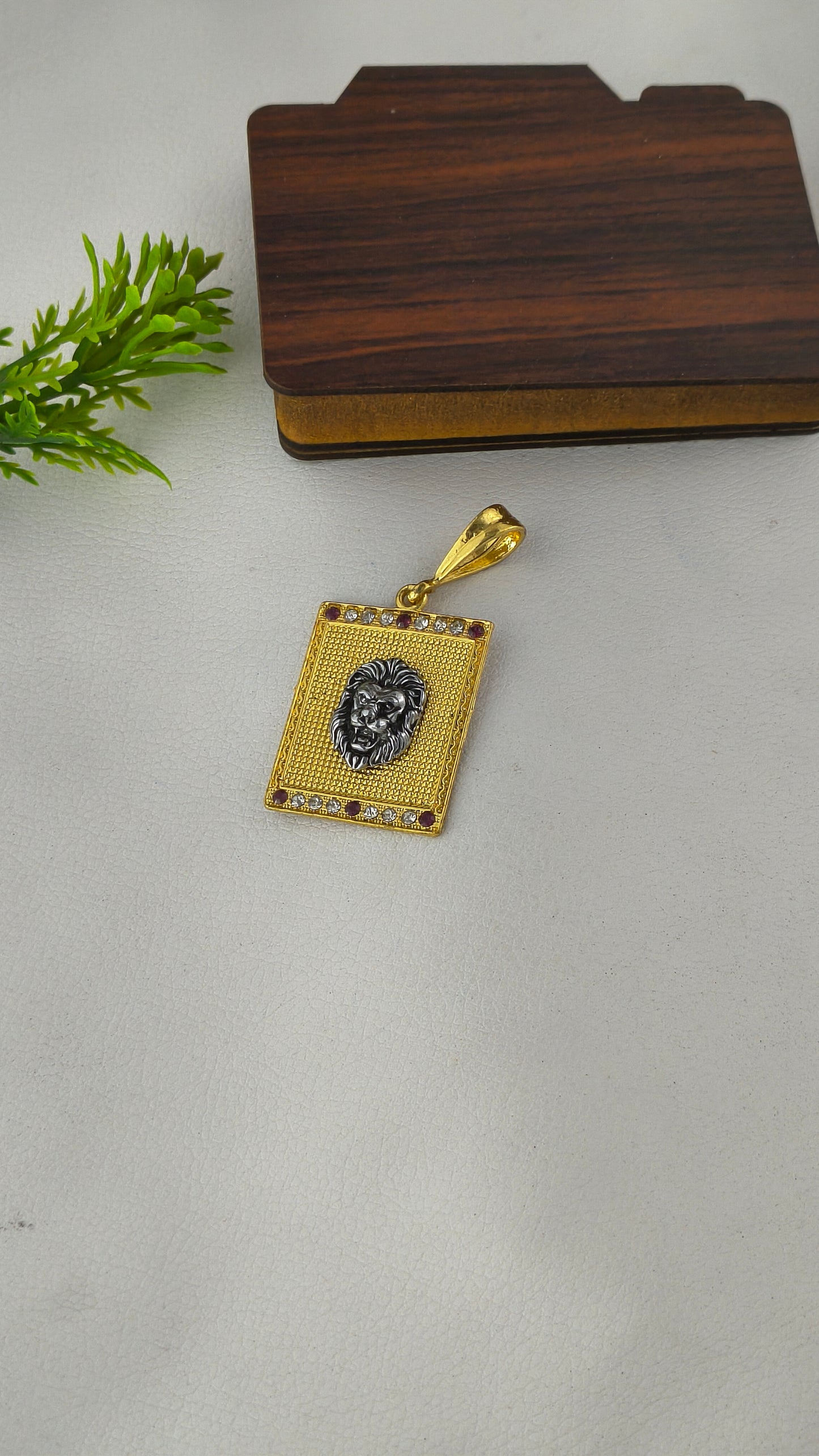 Silver Lion Head on Gold Plated Base Pendant.