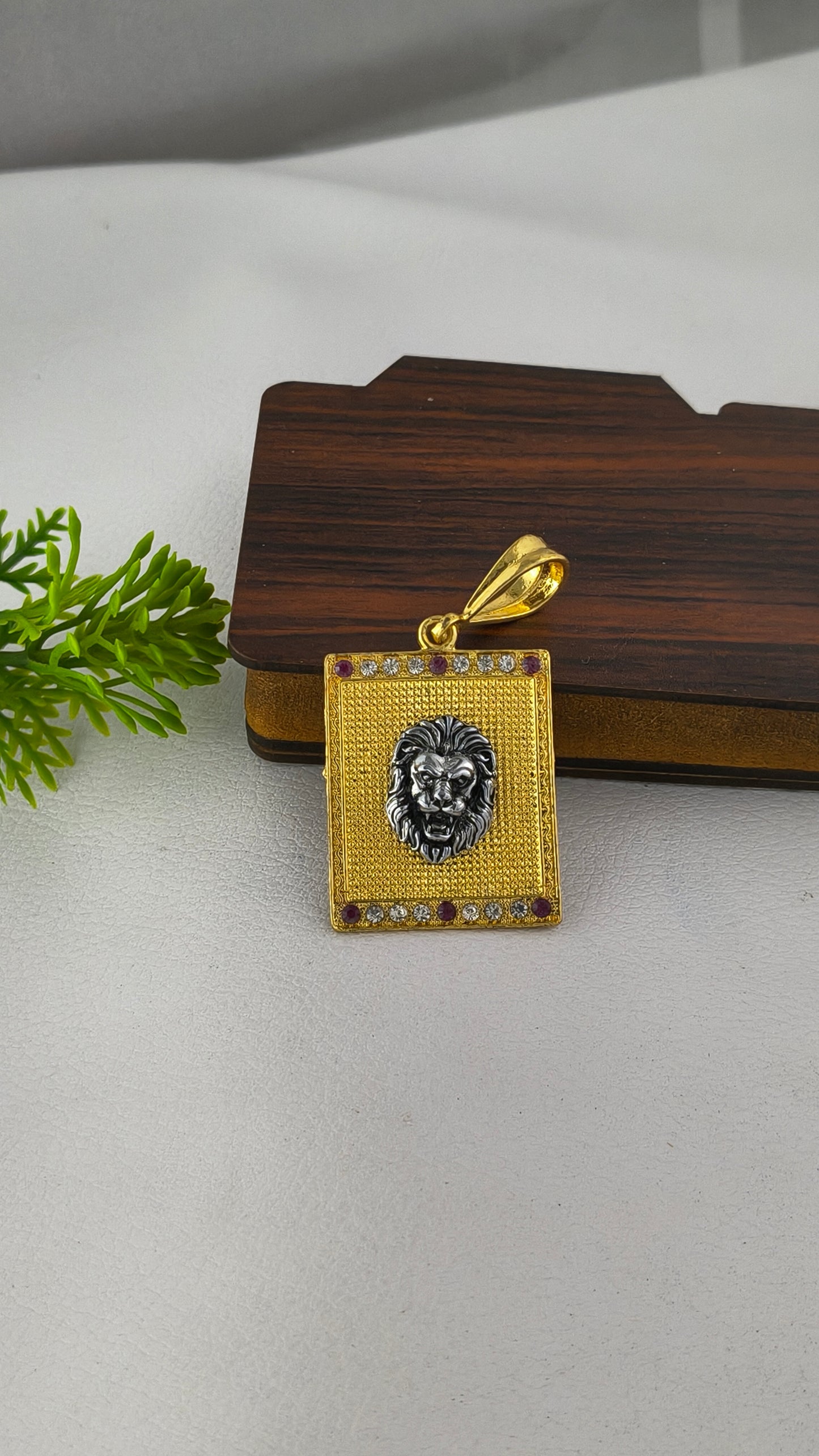 Silver Lion Head on Gold Plated Base Pendant.