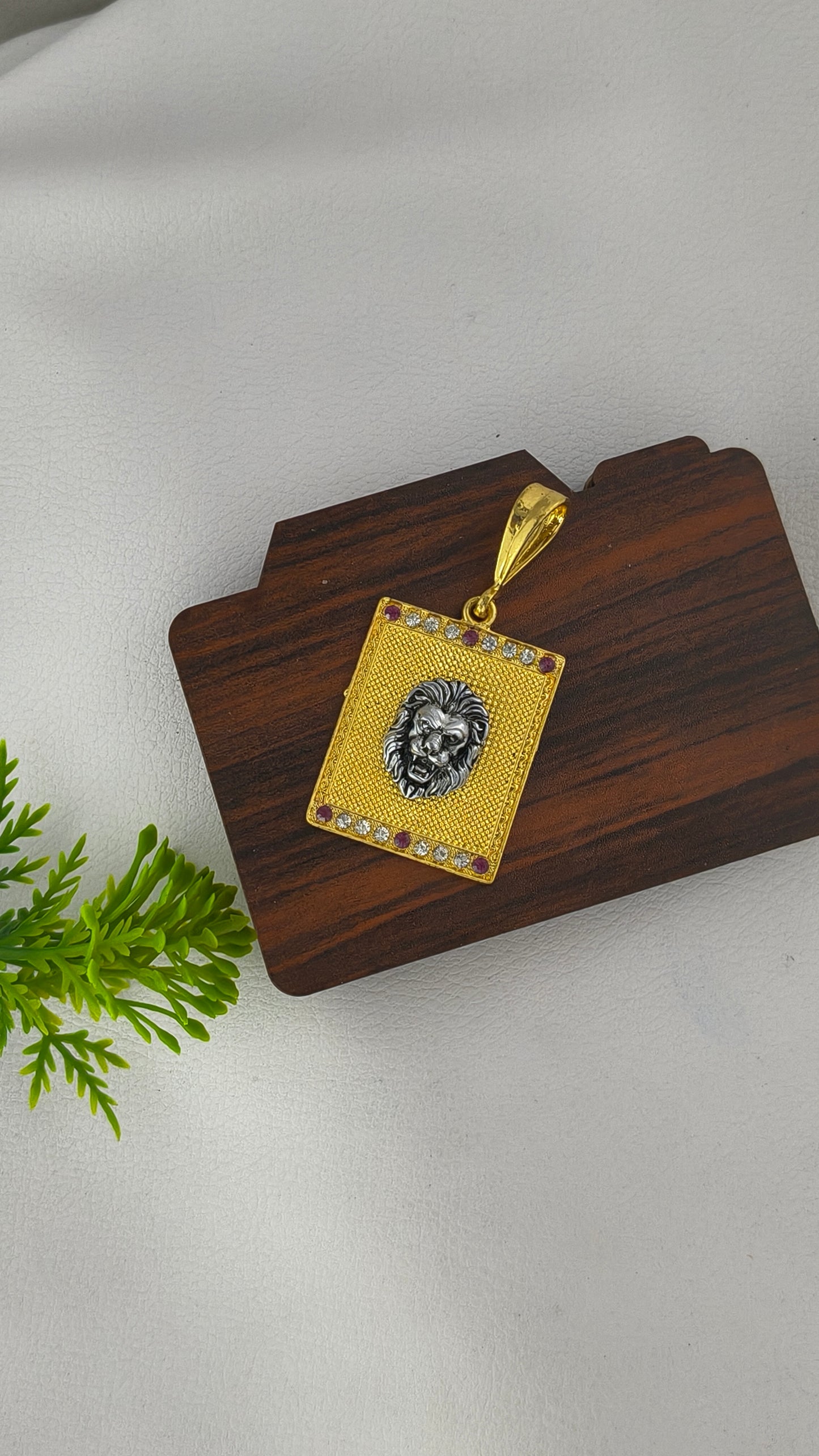 Silver Lion Head on Gold Plated Base Pendant.