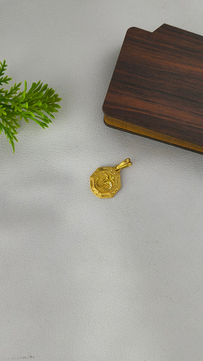 An Octagonal Gold Om pendant, Highly Gold Plated .