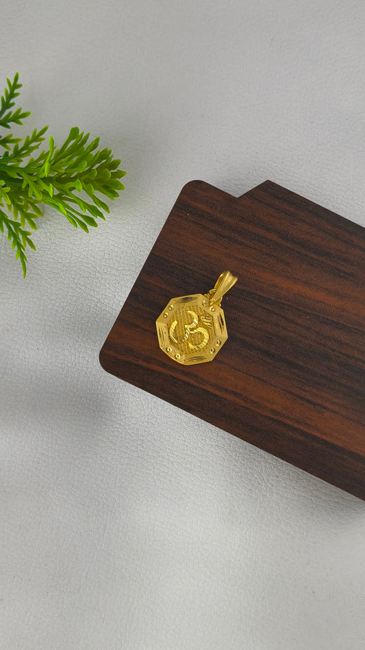 An Octagonal Gold Om pendant, Highly Gold Plated .
