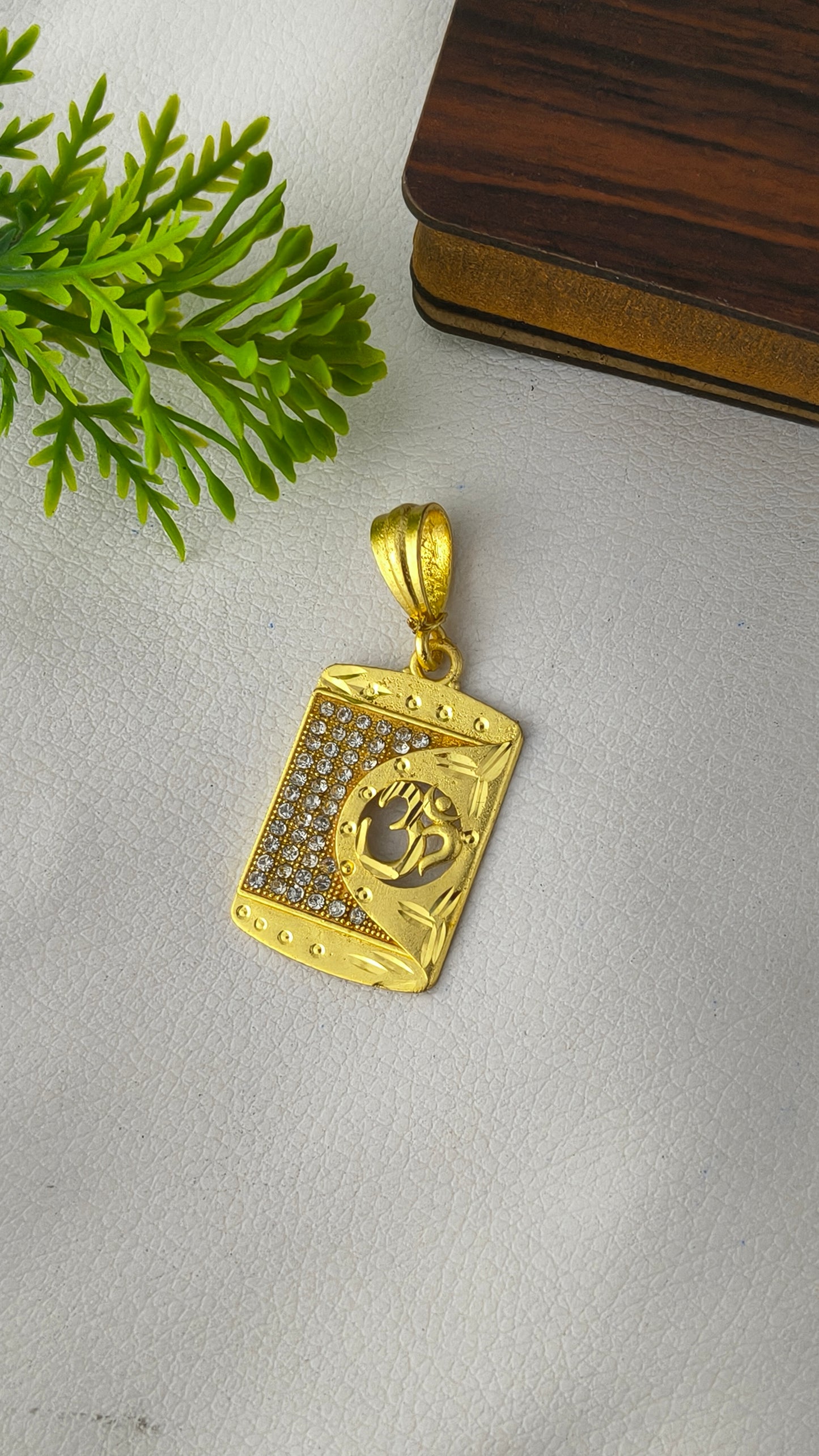 Gold Plated OM Diamond Pendant.