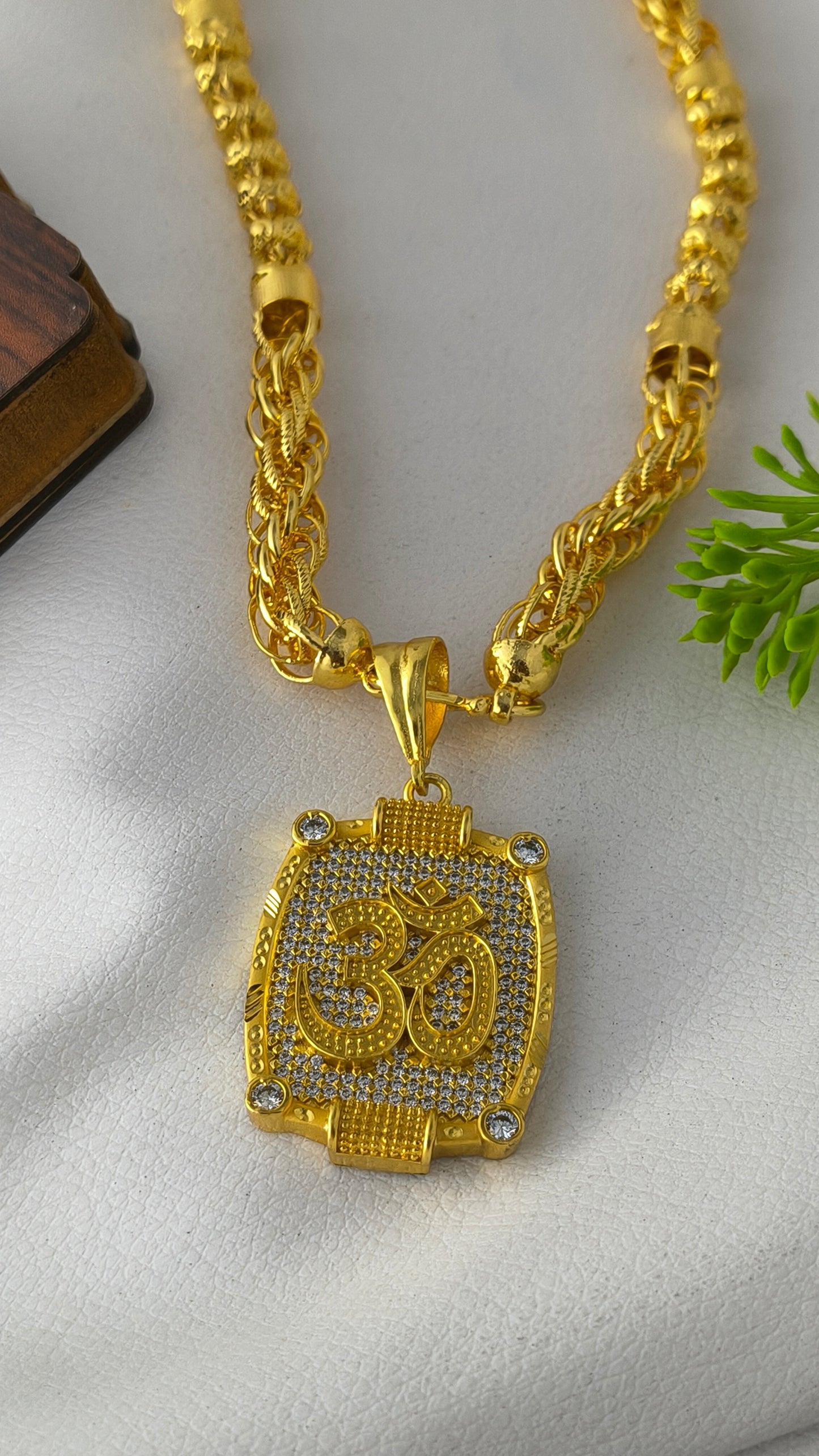 Gold-plated OM pendant with Bahubali heavy design chain Combo Set.