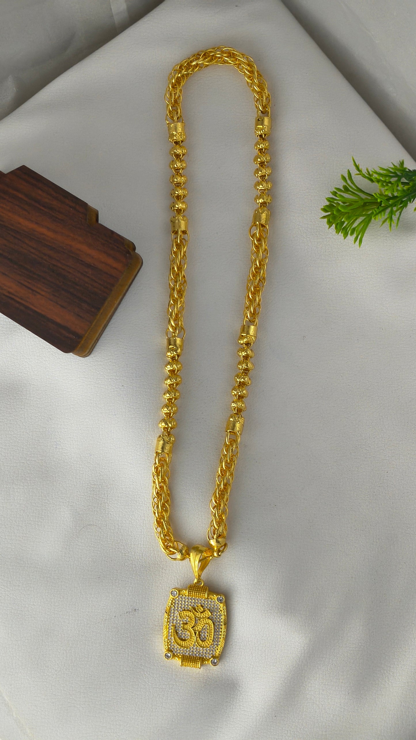 Gold-plated OM pendant with Bahubali heavy design chain Combo Set.